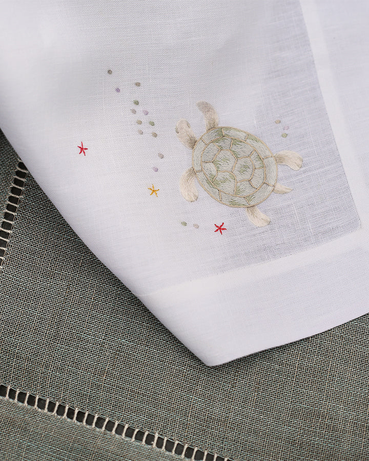 Turtle Napkin shown with Belgian Linien in Grey